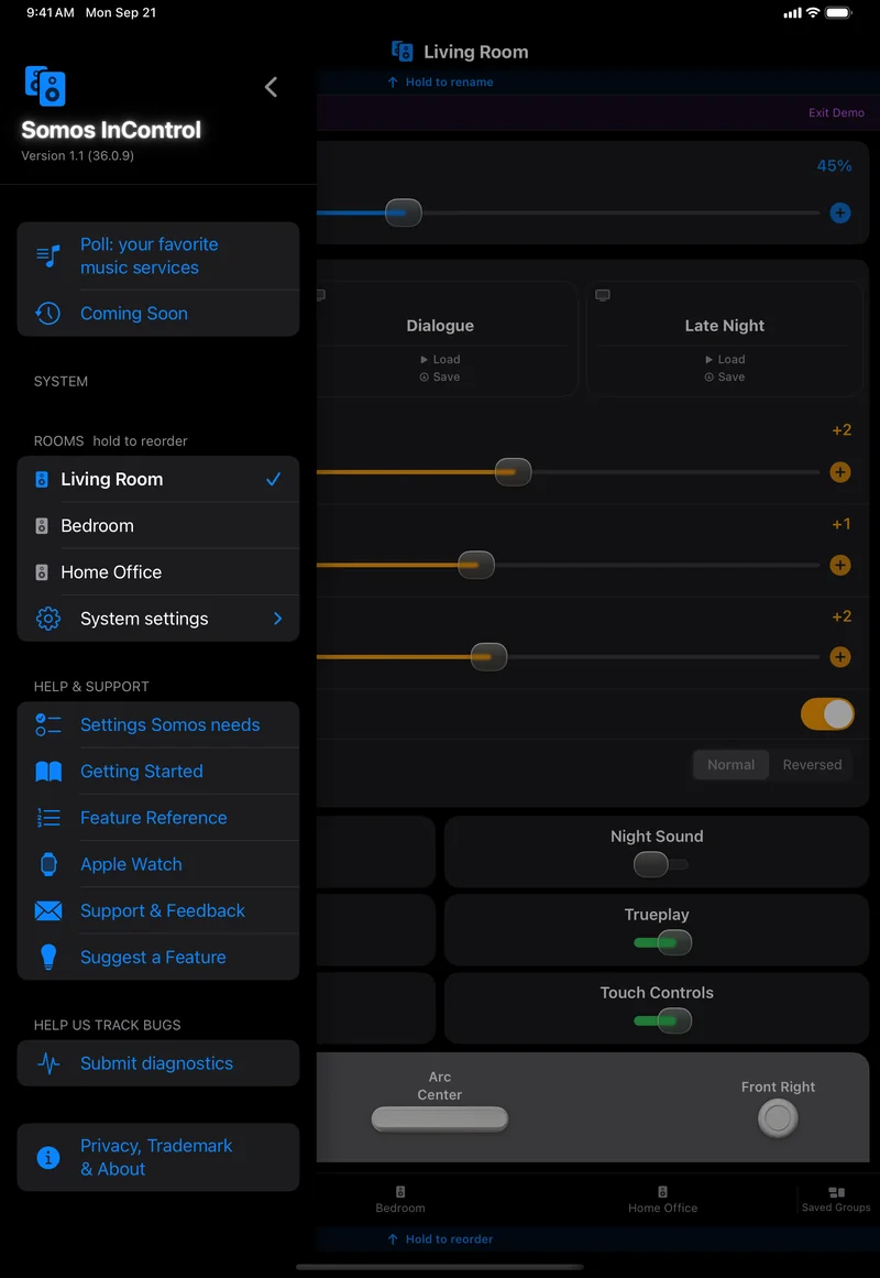 The side menu open over the Living Room page on an iPad in dark mode: Somos InControl and its version, Poll: your favorite music services, Coming Soon, System, Rooms with Living Room ticked, Bedroom, Home Office and System settings, Help and Support with Settings Somos needs, Getting Started, Feature Reference, Apple Watch, Support and Feedback and Suggest a Feature, Submit diagnostics, and Privacy, Trademark and About.